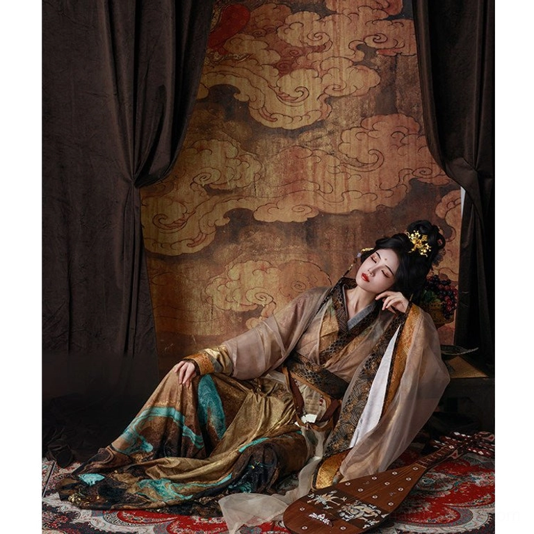Yellow and earthy-toned Dunhuang-inspired Wei Jin Dynasty Hanfu with flowing silk-like layers, cyan traditional patterns and cross-collar design