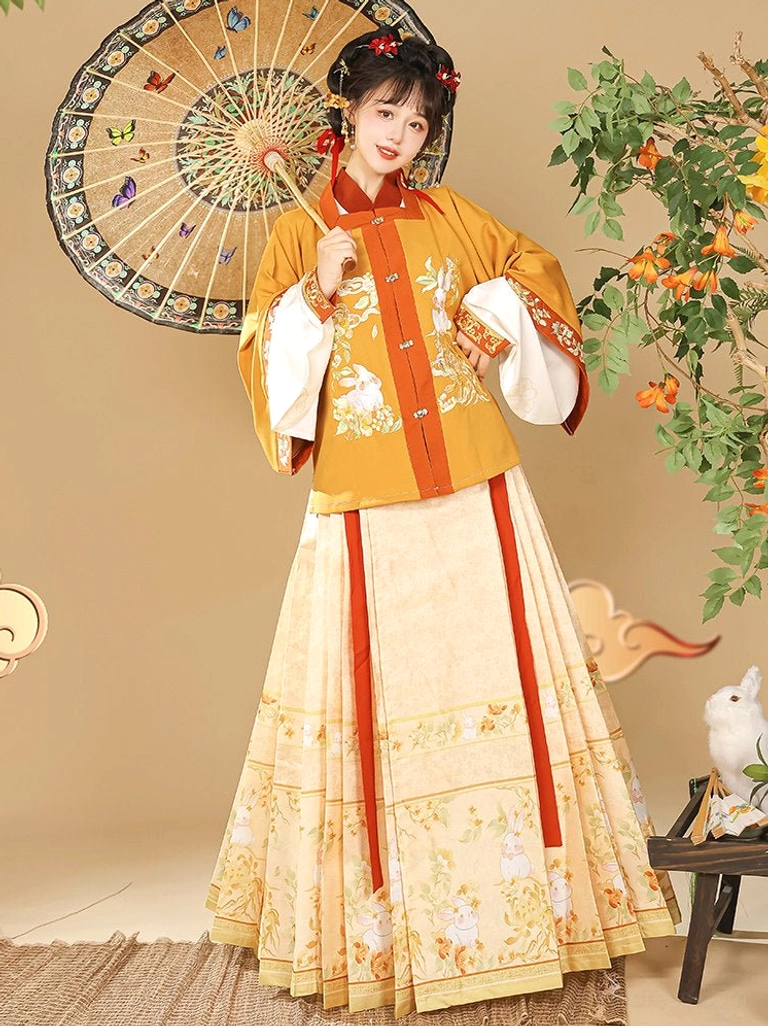 Yellow Ming Dynasty Hanfu square collar jacket and cream printed mamian skirt with Money Rabbit motif