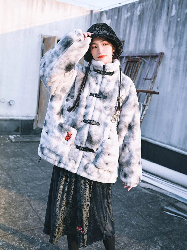 Yinhu Tiger modern Hanfu faux rabbit fur jacket shown in a three-quarter front full-body view with grey white tie-dye plush texture, stand collar, leather-look buckle closures, embroidered tiger pattern, and red front pocket tag