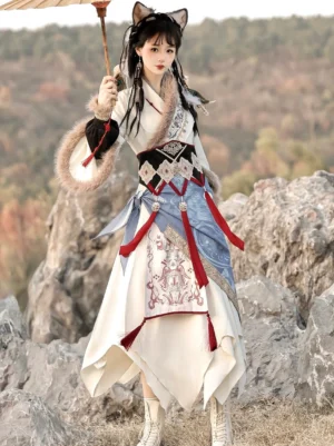 Yuanshan Yin modern Hanfu swordswoman outfit front view with fuzzy trim sleeves, embroidered waist seal, red tassels and asymmetrical skirt