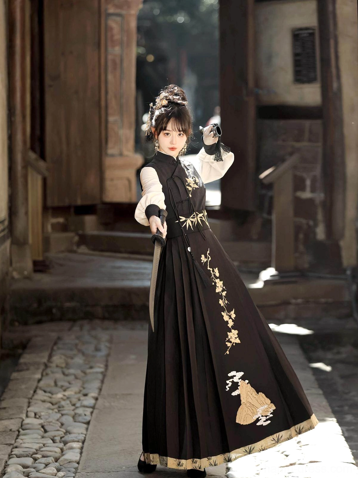 Yunshan martial arts inspired modern Hanfu set with ivory puff sleeves, black embroidered vest and flowing pleated maxi skirt