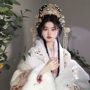 Model wearing Yunyan blue cloisonne Hanfu crown headpiece with pearl beads and long gold tassel hair ornaments