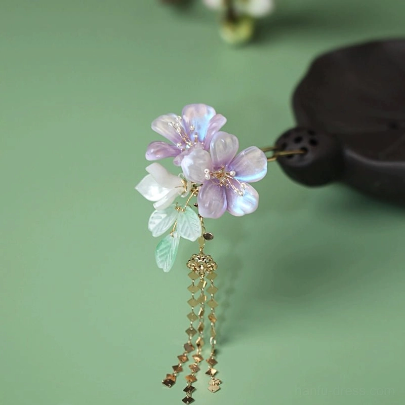 Ziqing Hanfu floral hair pin featuring purple flowers pale green leaves white accents and layered gold tassels