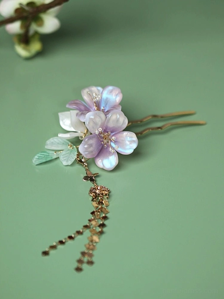 Close-up of Ziqing Chinese style purple flower hair pin with layered gold tassels for Hanfu and qipao hair styling