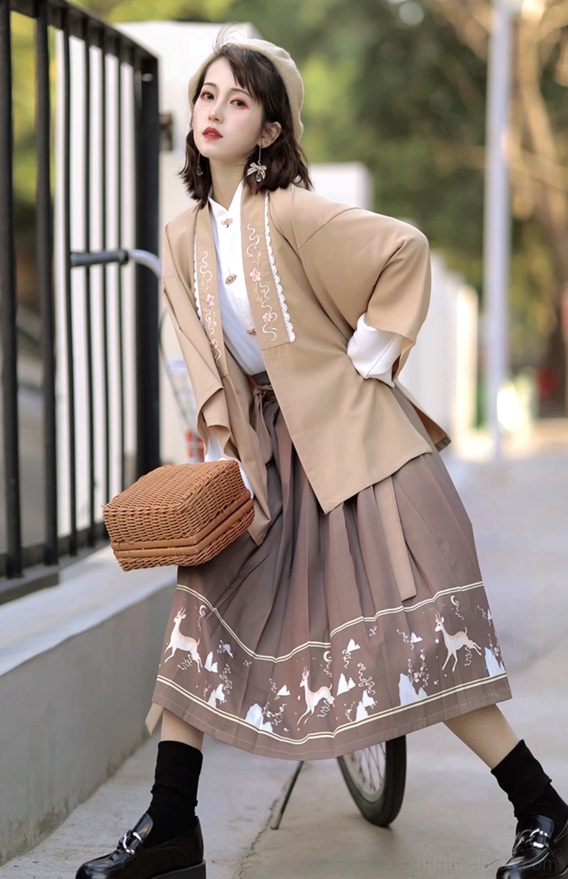 Full-body khaki modern Hanfu streetwear outfit with floral embroidered cardigan, brown deer-print pleated skirt, black leather shoes, socks and basket bag